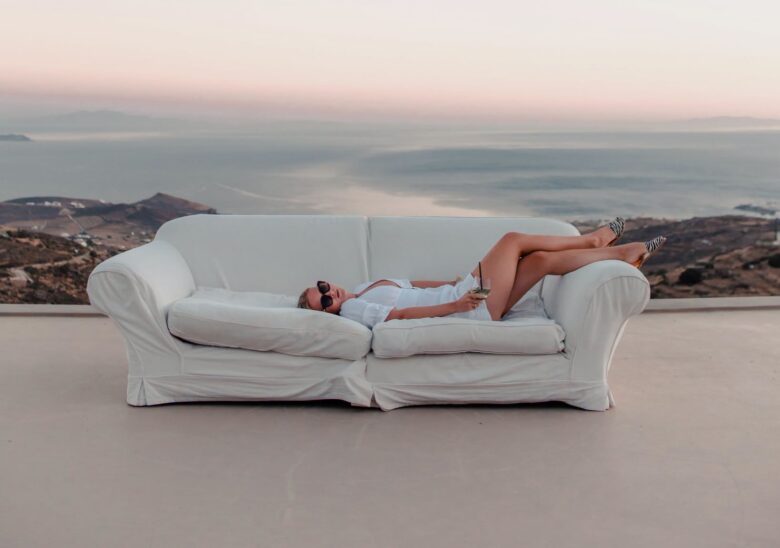 Women Lying on Sofa